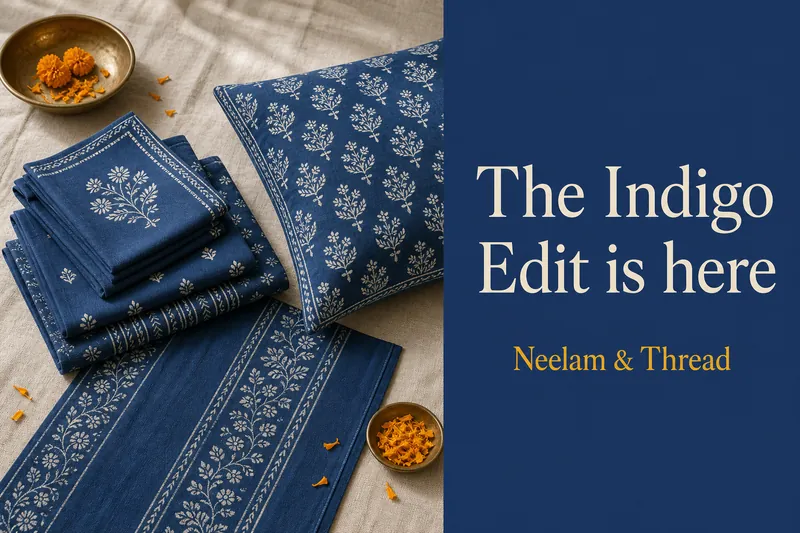 Ad banner with a flat lay of indigo printed textiles and the text The Indigo Edit is here